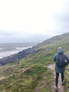 person by cliff walk